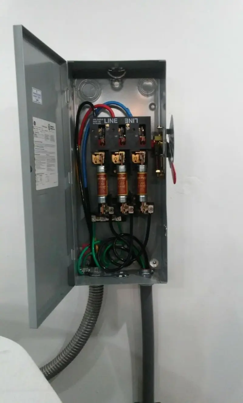 Three-phase disconnect switch installed for Smoke Detector Installation in Juno Beach